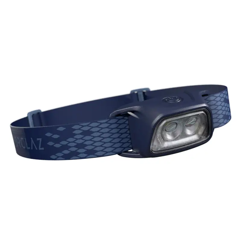 Forclaz HL100 USB head torch on its strap.